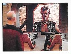 1987 Panini Star Trek: The Next Generation Stickers #65 Picard on bridge facing Lutan on viewscreen Front