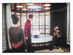 1987 Panini Star Trek: The Next Generation Stickers #90 Troi, Riker and Yar examining face-box on transporter pad Front
