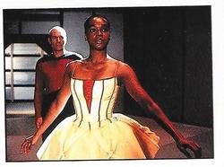 1987 Panini Star Trek: The Next Generation Stickers #136 Crewmember as ballerina with Picard in background Front
