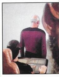 1987 Panini Star Trek: The Next Generation Stickers #153 Picard facing Ferengi on viewscreen (left half) Front