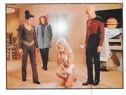 1987 Panini Star Trek: The Next Generation Stickers #205 Picard, Troi and Dr. Crusher watching Rivan kneel reverently Front