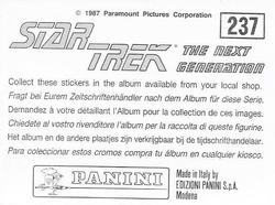 1987 Panini Star Trek: The Next Generation Stickers #237 A female Klingon crawling towards Worf Back