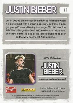 2012 Panini Justin Bieber #11 Justin added an international flavor to his music when he performed with Korean pop star Jay Park... Back