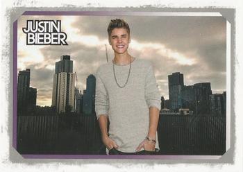 2012 Panini Justin Bieber #13 The pop sensation took time Down Under to do a photo shoot on the rooftops at Fox FM Studios in Melbourne, Australia. Front