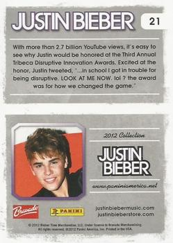 2012 Panini Justin Bieber #21 With more than 2.7 billion YouTube views, it's easy to see why Justin would be honored at the Third Annual Tribeca Disruptive Innovation Awards. Back