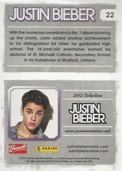 2012 Panini Justin Bieber #22 With the numberous awards and a No. 1 album blowing up the charts, Justin added another achievement... Back