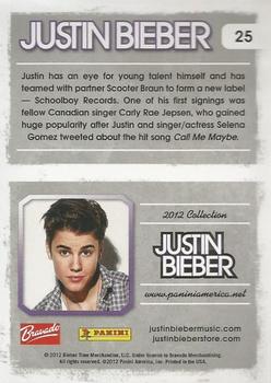 2012 Panini Justin Bieber #25 Justin has an eye for young talent himself and has teamed with partner Scooter Braun to form a new label... Back