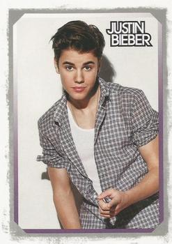 2012 Panini Justin Bieber #25 Justin has an eye for young talent himself and has teamed with partner Scooter Braun to form a new label... Front