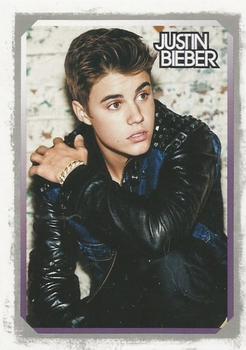 2012 Panini Justin Bieber #44 Growing up as a kid in Canada, you can bet Justin was more than a fan of hockey. Front