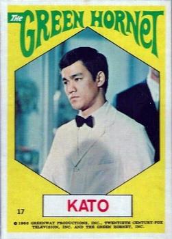 1966 Topps The Green Hornet Stickers #17 Kato (yellow; green letters; image in hexagon) Front