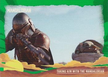 2020 Topps Star Wars The Mandalorian Journey of the Child - Green #4 Taking Aim with the Mandalorian Front