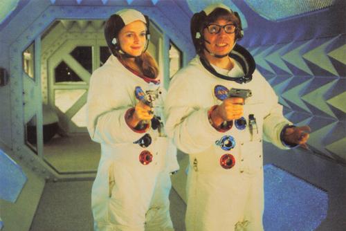 1998-99 Panini Austin Powers Photocards #54 Felicity and Austin in spacesuits Front