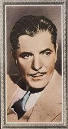 1936 Godfrey Phillips Stars of the Screen - Embossed #44 Warner Baxter Front