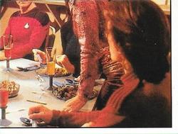1992 Panini Star Trek: The Next Generation Stickers (Red backs) #104 Dinner scene, Picard, Deanna and Wyatt (lower right) Front