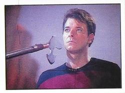 1992 Panini Star Trek: The Next Generation Stickers (Red backs) #176 Riker, unwavering, as a weapon is thrust next to his face Front
