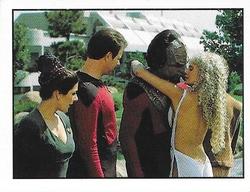 1992 Panini Star Trek: The Next Generation Stickers (Red backs) #185 Troi and Riker watching Worf get kissed by Rivan Front
