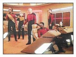 1992 Panini Star Trek: The Next Generation Stickers (Red backs) #212 Bridge crew, alarmed and armed, looking off to the left Front
