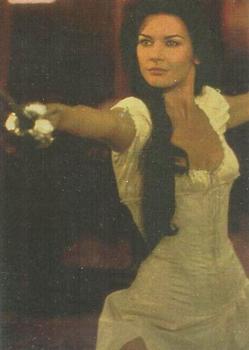 1998 DuoCards The Mask of Zorro - Catherine Zeta-Jones OmniChrome #5 Handling a foil with the same Front