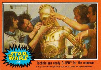 1977 Topps Star Wars #306 Technicians ready C-3PO for the cameras Front