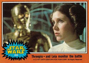 1977 Topps Star Wars #266 Threepio and Leia monitor the battle Front