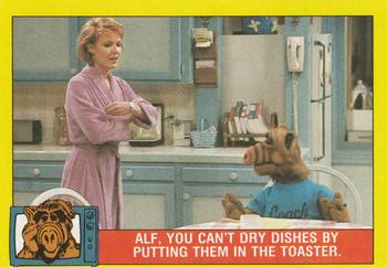 1987 Topps ALF #20 Alf, you can't dry dishes by putting them in the toaster Front