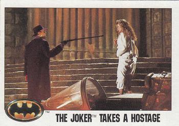 1989 Topps Batman #111 The Joker takes a Hostage Front