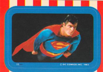 1983 Topps Superman III - Stickers #11 (Superman flying, arms at sides, black background) Front