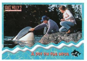 1995 SkyBox Free Willy 2: The Adventure Home #19 A pat on the nose Front