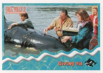 1995 SkyBox Free Willy 2: The Adventure Home #35 Giving aid Front