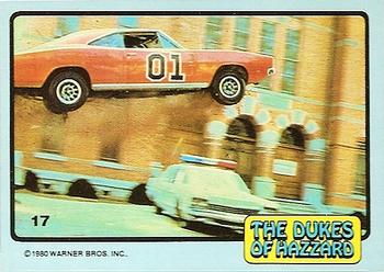 1980 Donruss Dukes of Hazzard #17 The General Lee Jumping Police Car Front