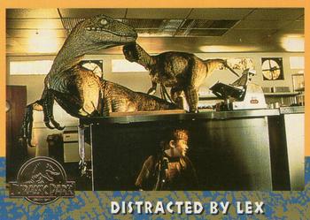 1993 Topps Jurassic Park Gold #59 Distracted by Lex Front