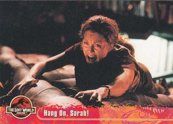 1997 Topps The Lost World: Jurassic Park #34 Hang On, Sarah! Front