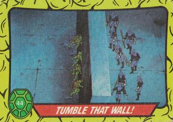 1989 Topps Teenage Mutant Ninja Turtles #44 Tumble That Wall! Front