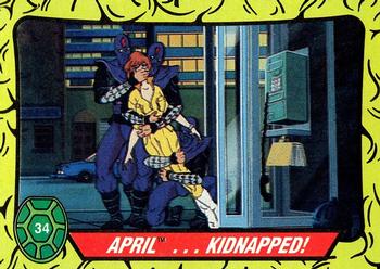 1989 Topps Teenage Mutant Ninja Turtles #34 April ... Kidnapped! Front