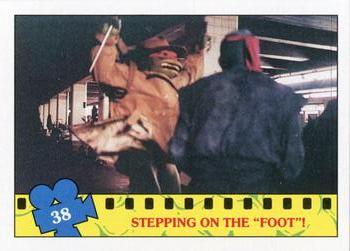 1990 Topps Teenage Mutant Ninja Turtles: The Movie #38 Stepping on the 