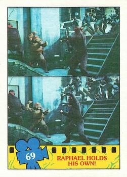 1990 Topps Teenage Mutant Ninja Turtles: The Movie #69 Raphael Holds His Own! Front