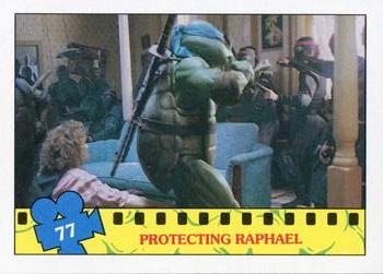 1990 Topps Teenage Mutant Ninja Turtles: The Movie #77 Protecting Raphael Front