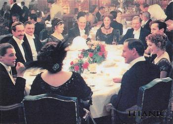 1998 Inkworks Titanic (Movie) #10 Jack holds his own at the dinner party as Cal... Front