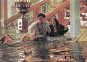 1998 Inkworks Titanic (Movie) #22 Cal tricks Rose into getting into a lifeboat. Front