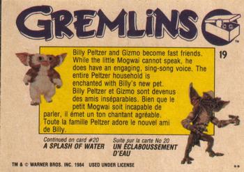 1984 O-Pee-Chee Gremlins #19 Billy and Gizmo Back