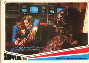 1976 Donruss Space: 1999 #13 Comdr. Koenig and Dr. Russell come face to face with terror. Front