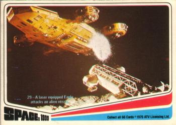 1976 Donruss Space: 1999 #29 A laser equipped Eagle attacks an alien vessel. Front