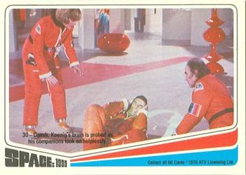 1976 Donruss Space: 1999 #30 Comdr. Koenig's brain is probed as his companions look on helplessly. Front