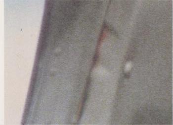 1983 Donruss Magnum P.I. #58 (plum shirt, gray collar) Back
