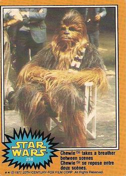 1977 O-Pee-Chee Star Wars #258 Chewie takes a breather between scenes Front