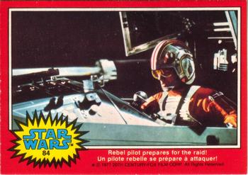 1977 O-Pee-Chee Star Wars #84 Rebel pilot prepares for the raid! Front