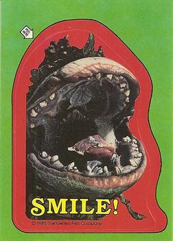1986 Topps Little Shop of Horrors #10 Smile! / Audrey dreams of a wonderful Front