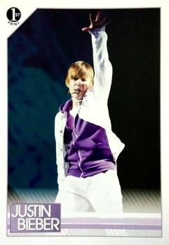 2010 Panini Justin Bieber #11 All throughout his My World Tour, Justin showe Front