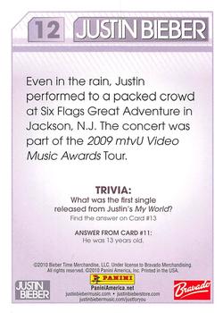 2010 Panini Justin Bieber #12 Even in the rain, Justin performed to a packed Back