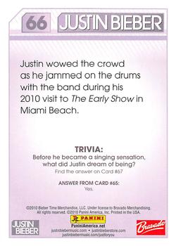 2010 Panini Justin Bieber #66 Justin wowed the crowd as he jammed on the dru Back